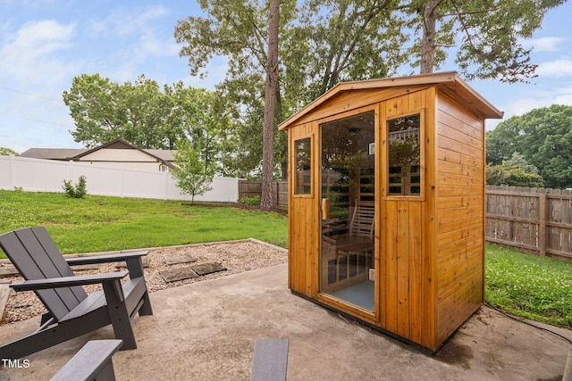 5400 Kaplan Dr, Raleigh, NC 27606 - view of outbuilding with a fenced backyard