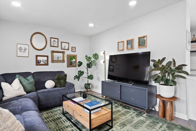 5400 Kaplan Dr, Raleigh, NC 27606 - living room with recessed lighting and wood finished floors