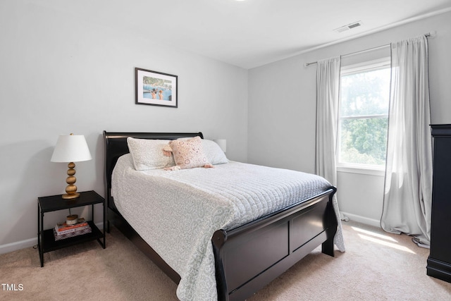 5400 Kaplan Dr, Raleigh, NC 27606 - carpeted bedroom with baseboards