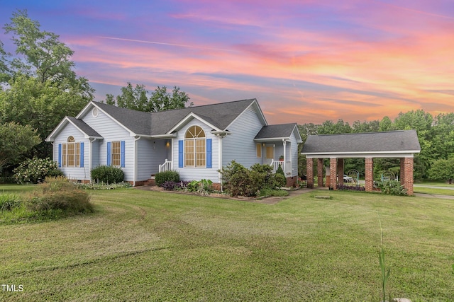 2312 Buckstone Ct, Fuquay Varina, NC 27526 - ranch-style house featuring a lawn