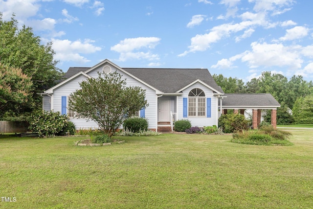 2312 Buckstone Ct, Fuquay Varina, NC 27526 - ranch-style house with a front yard and roof with shingles