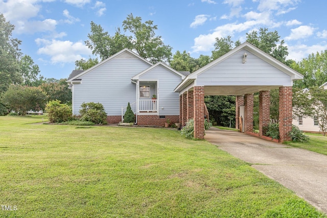 2312 Buckstone Ct, Fuquay Varina, NC 27526 - view of front of property featuring concrete driveway, a carport, and a front lawn