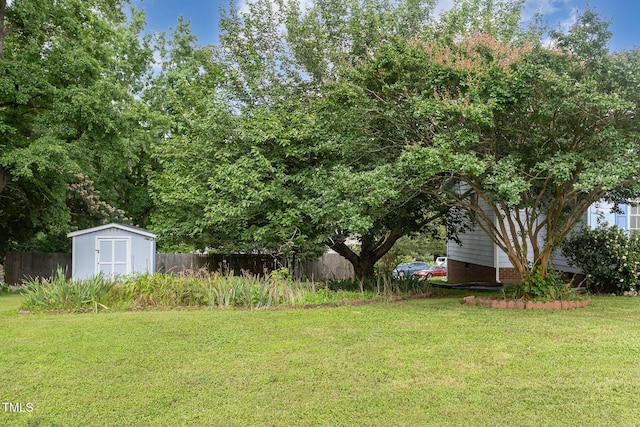 2312 Buckstone Ct, Fuquay Varina, NC 27526 - view of yard featuring a storage unit