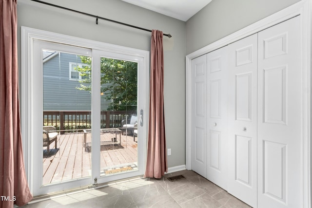 5301 Denmead Way, Raleigh, NC 27613 - doorway to outside with marble look tiles