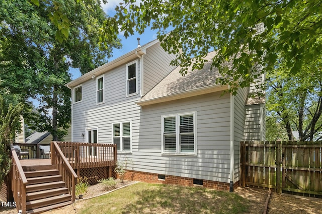 5301 Denmead Way, Raleigh, NC 27613 - rear view of property featuring crawl space, a shingled roof, and a deck