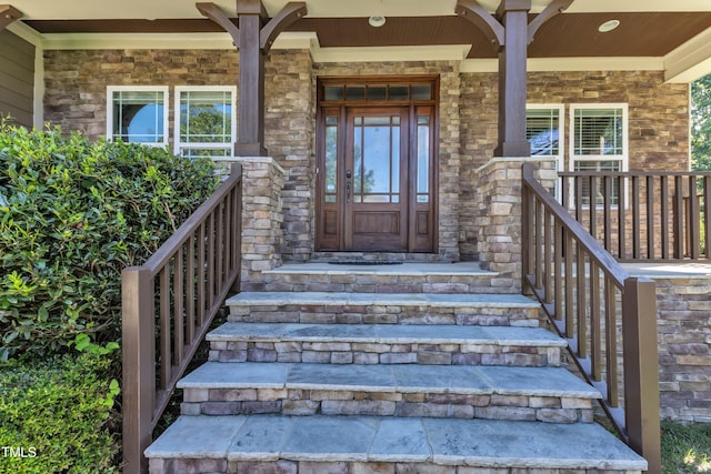 6332 Mountain Oaks Way, Wake Forest, NC 27587 - doorway to property featuring covered porch