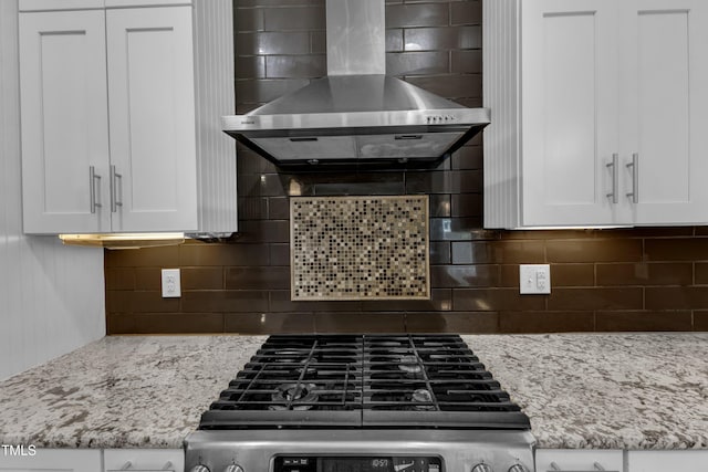 6332 Mountain Oaks Way, Wake Forest, NC 27587 - kitchen featuring wall chimney range hood, stainless steel gas range oven, white cabinetry, and decorative backsplash