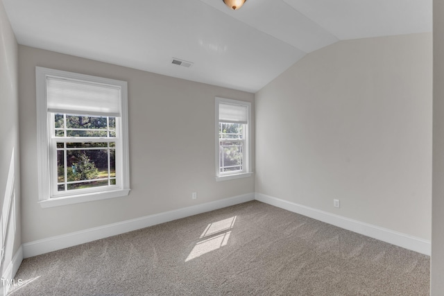 6332 Mountain Oaks Way, Wake Forest, NC 27587 - spare room with vaulted ceiling and carpet
