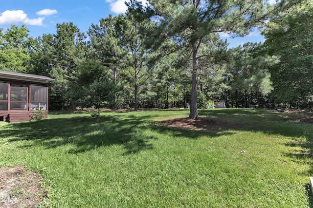 6332 Mountain Oaks Way, Wake Forest, NC 27587 - view of grassy yard with a sunroom