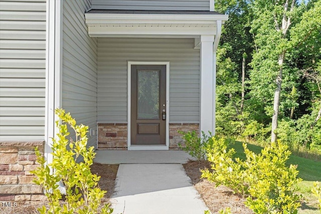 94 Taverners Ln, Angier, NC 27501 - property entrance with stone siding