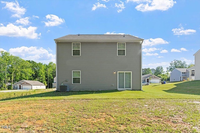 94 Taverners Ln, Angier, NC 27501 - back of house featuring a yard