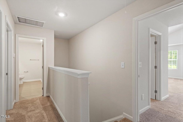 94 Taverners Ln, Angier, NC 27501 - hallway featuring an upstairs landing and carpet