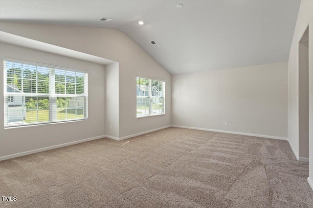 94 Taverners Ln, Angier, NC 27501 - carpeted spare room featuring lofted ceiling and healthy amount of natural light