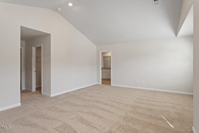 94 Taverners Ln, Angier, NC 27501 - spare room with lofted ceiling, carpet, and recessed lighting