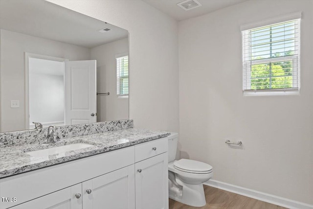 94 Taverners Ln, Angier, NC 27501 - bathroom with wood finished floors and vanity
