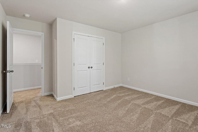 94 Taverners Ln, Angier, NC 27501 - unfurnished bedroom with carpet floors and a closet
