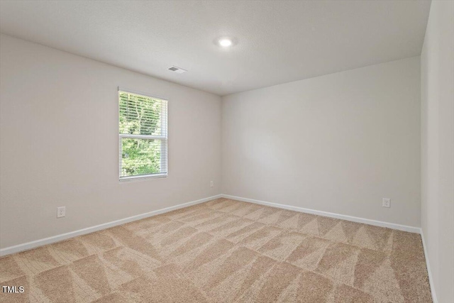 94 Taverners Ln, Angier, NC 27501 - empty room featuring light carpet and recessed lighting