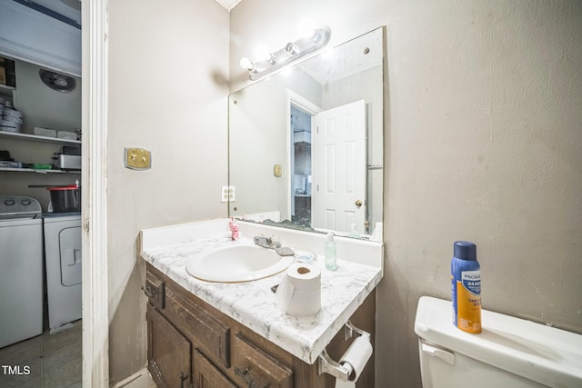 2504 Lancaster Rd NW, Wilson, NC 27896 - bathroom with washing machine and clothes dryer and vanity