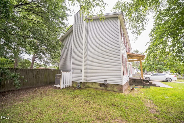 2504 Lancaster Rd NW, Wilson, NC 27896 - view of property exterior with a chimney and crawl space