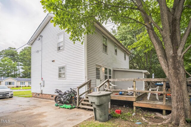 2504 Lancaster Rd NW, Wilson, NC 27896 - rear view of house featuring crawl space and a deck