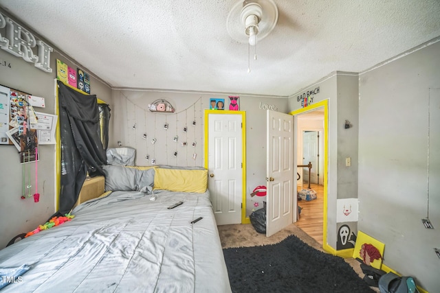 2504 Lancaster Rd NW, Wilson, NC 27896 - bedroom with carpet, a textured ceiling, and a ceiling fan
