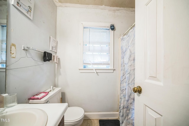 2504 Lancaster Rd NW, Wilson, NC 27896 - full bathroom with vanity and a shower with shower curtain