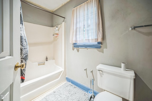2504 Lancaster Rd NW, Wilson, NC 27896 - bathroom with toilet and shower / bath combo with shower curtain