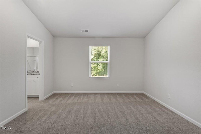 154 Taverners Ln, Angier, NC 27501 - spare room featuring carpet flooring