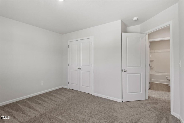 154 Taverners Ln, Angier, NC 27501 - unfurnished bedroom with carpet flooring and a closet