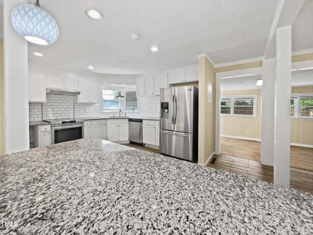 3205 Marita Dr, Fayetteville, NC 28301 - kitchen with stainless steel appliances, white cabinets, backsplash, light stone countertops, and recessed lighting