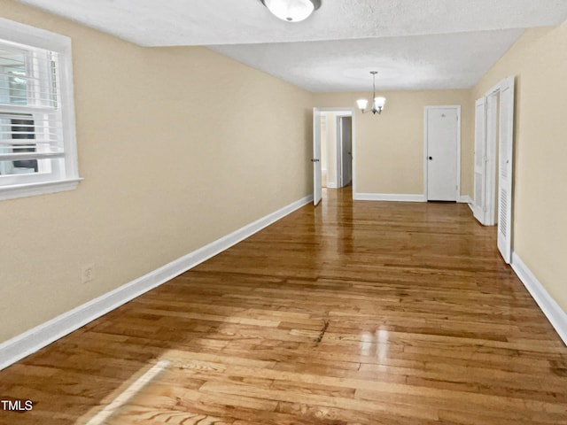 3205 Marita Dr, Fayetteville, NC 28301 - unfurnished dining area with a chandelier and wood finished floors