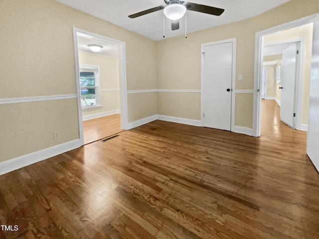 3205 Marita Dr, Fayetteville, NC 28301 - unfurnished bedroom with wood finished floors and ceiling fan