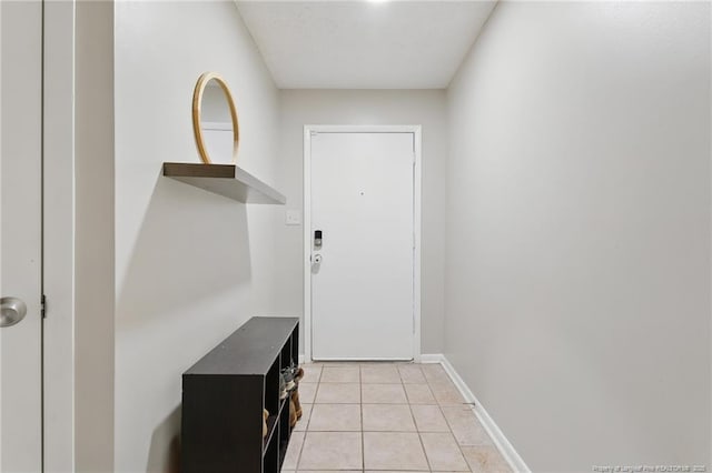 3511 Rolls Ave, Fayetteville, NC 28311 - doorway featuring light tile patterned flooring and baseboards