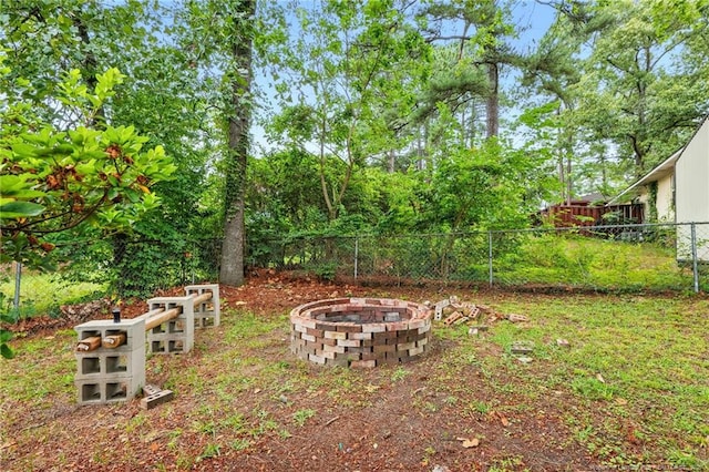 3511 Rolls Ave, Fayetteville, NC 28311 - view of yard featuring an outdoor fire pit