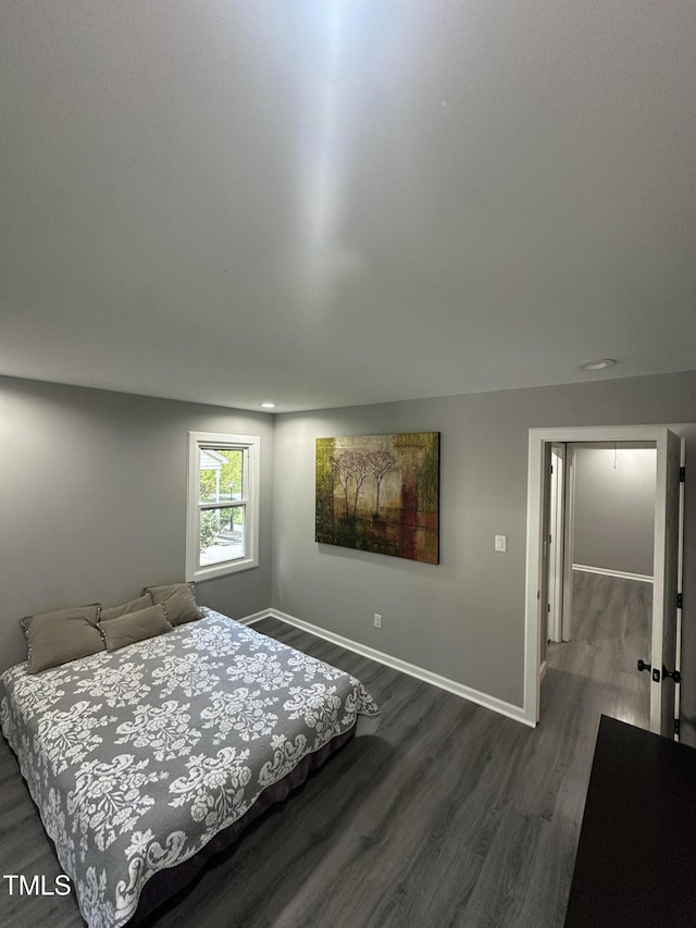 5809 Iris Lake Ct, Raleigh, NC 27604 - bedroom with dark wood-type flooring