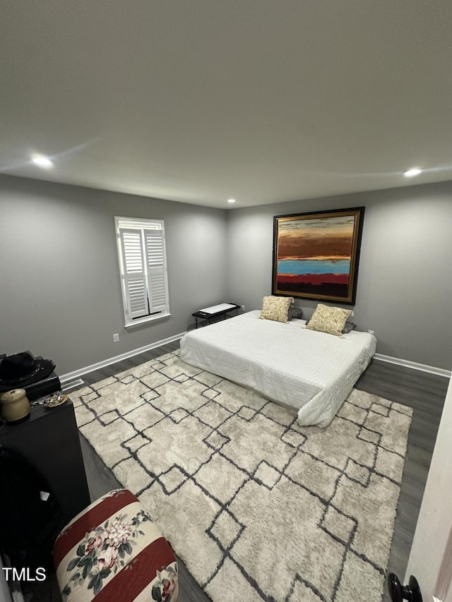 5809 Iris Lake Ct, Raleigh, NC 27604 - bedroom with recessed lighting and wood finished floors