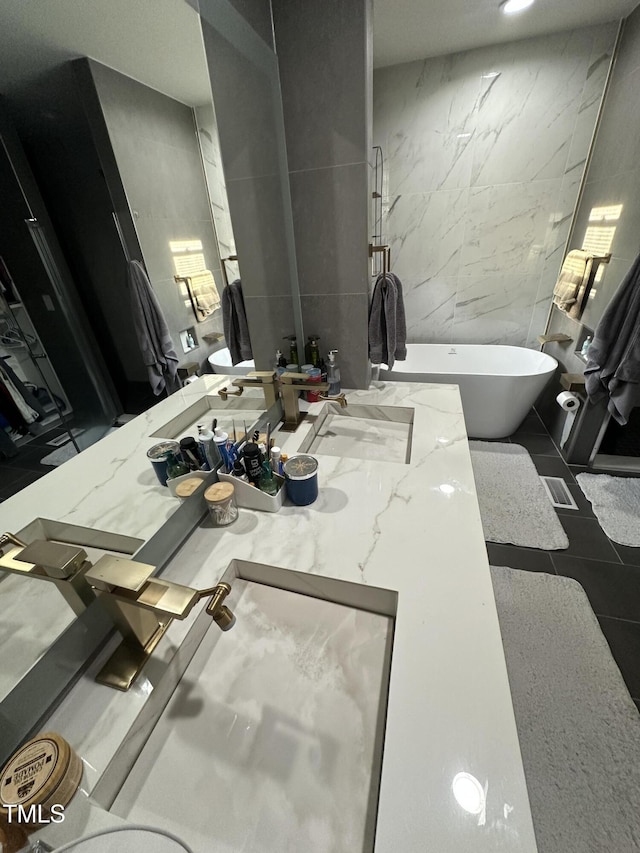 5809 Iris Lake Ct, Raleigh, NC 27604 - full bathroom featuring a freestanding bath, vanity, and tile walls