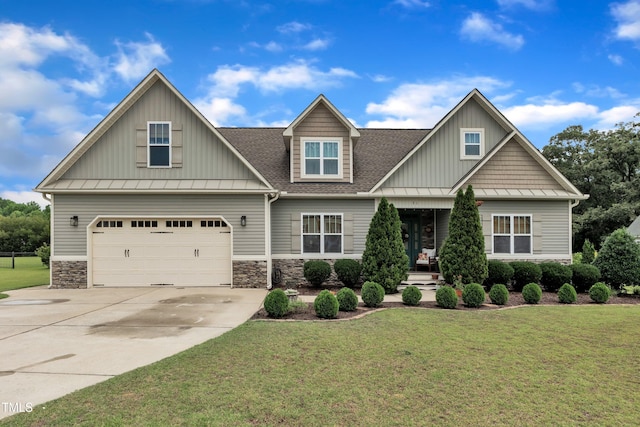 71 Smithsanders Ct, Smithfield, NC 27577 - craftsman inspired home featuring concrete driveway, a front lawn, a garage, and stone siding
