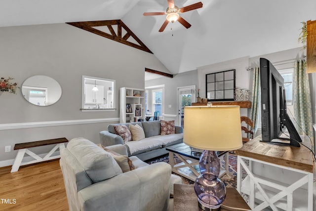 71 Smithsanders Ct, Smithfield, NC 27577 - living area with light wood finished floors, ceiling fan, and high vaulted ceiling