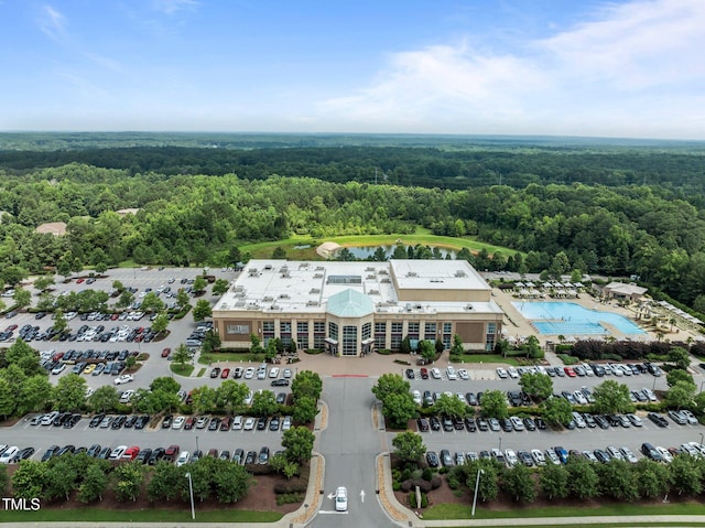 1304 Sandpiper Ct, Raleigh, NC 27615 - aerial view of a heavily wooded area and a nearby body of water