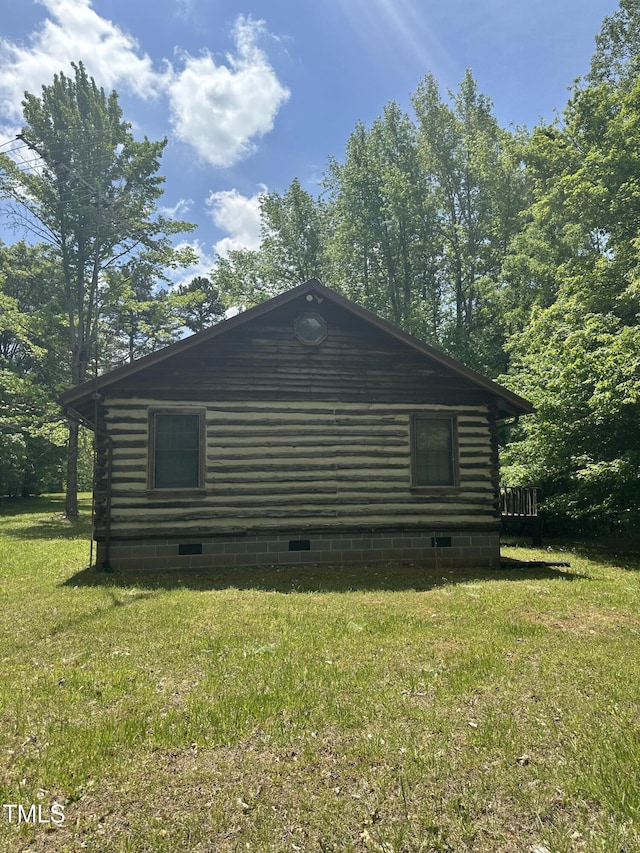 2011 Bowmantown Rd, Roxboro, NC 27574 - view of home's exterior featuring crawl space, a yard, and log exterior