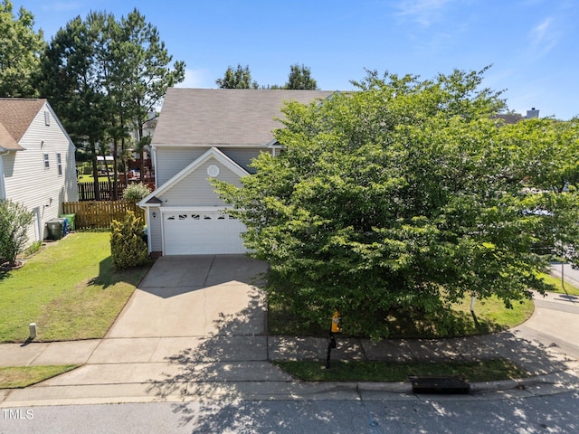 2037 Summer Shire Way, Raleigh, NC 27604 - view of property hidden behind natural elements featuring concrete driveway and a garage