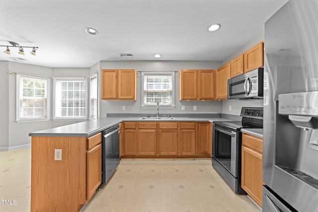 2037 Summer Shire Way, Raleigh, NC 27604 - kitchen featuring stainless steel appliances, a peninsula, plenty of natural light, recessed lighting, and light floors