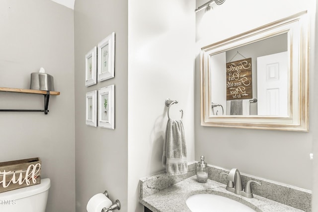 2218 Watersglen Dr, Apex, NC 27502 - bathroom featuring toilet and vanity