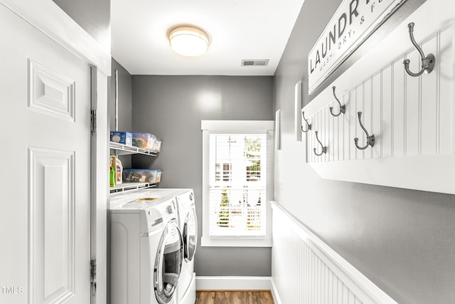 2218 Watersglen Dr, Apex, NC 27502 - washroom with independent washer and dryer and wood finished floors