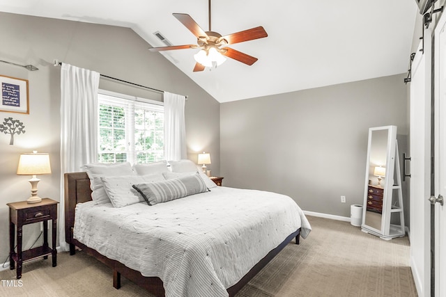 2218 Watersglen Dr, Apex, NC 27502 - bedroom featuring vaulted ceiling, light carpet, a ceiling fan, and a barn door