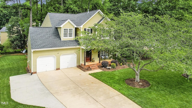 2218 Watersglen Dr, Apex, NC 27502 - view of front of home with a front yard, roof with shingles, driveway, and a porch