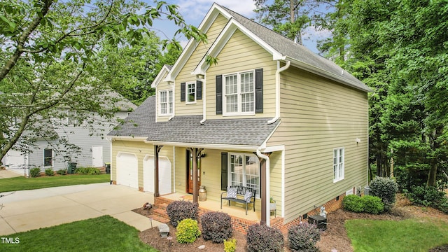 2218 Watersglen Dr, Apex, NC 27502 - traditional-style home with a porch, roof with shingles, driveway, and a front lawn
