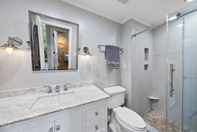 1500 River Mill Dr Unit 310, Wake Forest, NC 27587 - bathroom with vanity, a stall shower, and ornamental molding