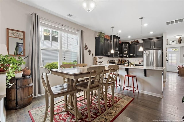 244 Great Enos Path, Hillsborough, NC 27278 - dining space with dark wood-type flooring and recessed lighting